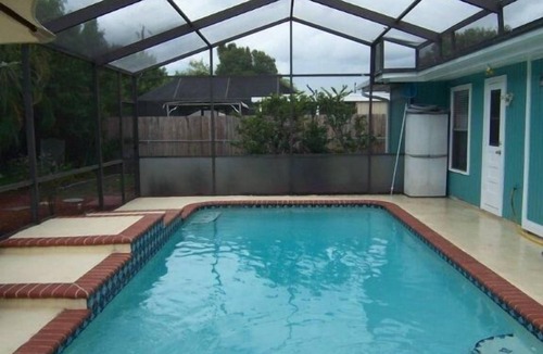 Sarasota House | Beautiful 4BR/2bath With HEATED POOL, Near Siesta Key & Lido Key Beach VR2400237