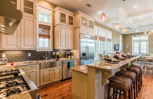 Watercolor House | Beautiful Camp District Retreat with Wraparound Decks and Beach Club Access