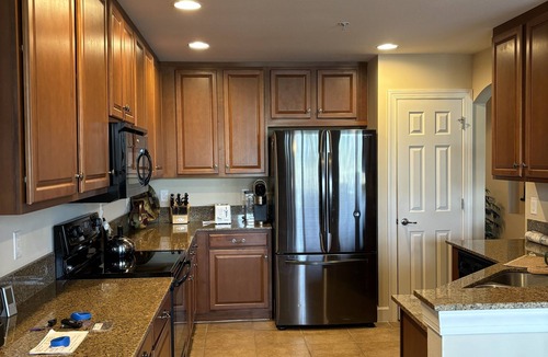 Naples Condo | Beautiful Coach home in The Quarry overlooking lake and golf course