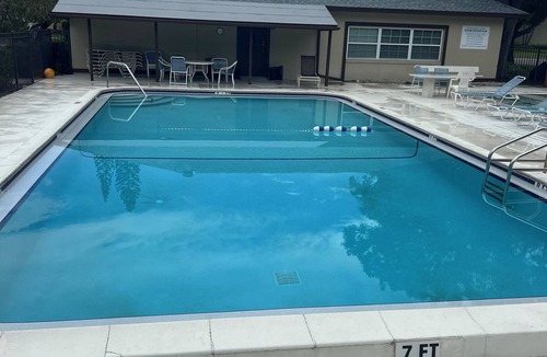 Largo House | Beautiful cozy villa with one bedroom plus den sleeps up to 4. 3 pools clubhouse