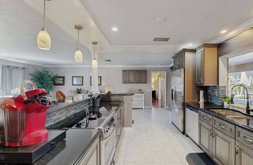 Lochmoor Waterway Estates House | Beautiful, dog-friendly home with in ground pool, putting green & sundeck