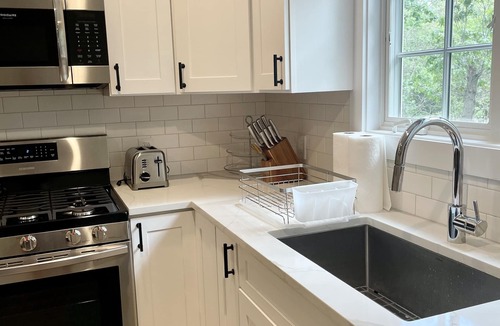 Springs House | Beautiful Home with walking distance to the beach, new 46ft pool! EV charger