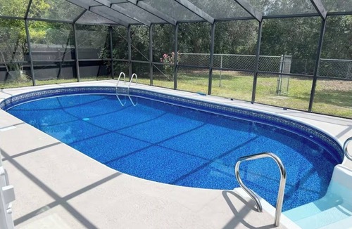 Ocala House | Beautiful home with Screened-In-Optional Heated Pool+Fence+Arcade + Karaoke+BBQ