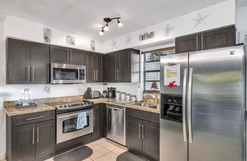 Rock Harbor House | Beautiful Lagoon, Ocean side Townhome at an Island resort!