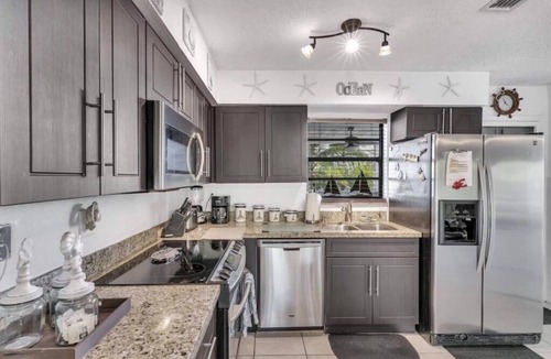 Rock Harbor House | Beautiful Lagoon, Ocean side Townhome at an Island resort!