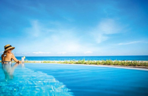 Singer Island Condo | Beautiful oceanfront studio condo with walk out patio.