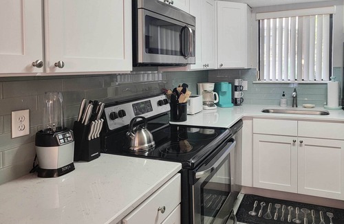 West Panama City Beach Apartment | Beautiful PCB Townhome: Balcony & Resort Amenities