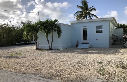 Key Largo Village House | Beautiful Remodeled Home on the Water! 40 ft dock & short walk to private beach!