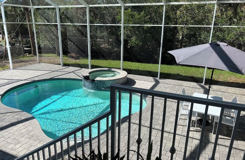 Bonita Bay House | Beautiful Waterfront Home with 2 Masters, Pool/Hot tub Close to Bonita Beach