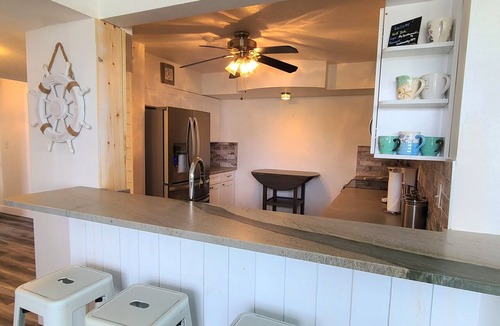 Isla del Sol Condo | Beautiful Waterfront Condo. Private Beach.