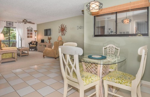 New Smyrna Beach Apartment | Beautifully updated bright and cheery 2nd story condo near pool beach access- SC261