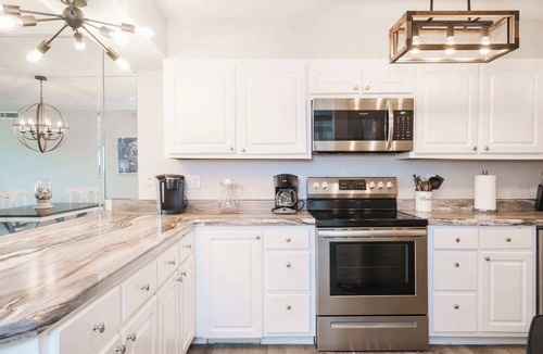 Biltmore Beach Condo | Bethy’s Beachy Beauty | Beachfront, Pools | Activity Access