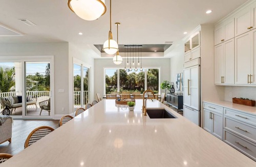Anna Maria House | Bikini Bottom: 5 Hole Mini Golft, Games,3 Blocks to Beach, Dog Friendly, Pool, by Anna Maria Life