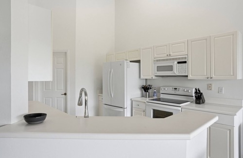 Bonita Bay Condo | Bonita Bay condo in Harbor Landing, 3 bedroom/2 bath with water view