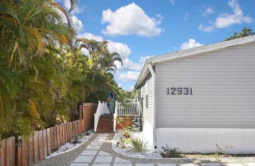 Iona House | Book A Paradise with Jacuzzi, BBQ & Paddleboards