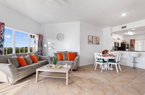 Florida Central Atlantic Coast Condo | Boutique Luxury Condo Private Balcony Lake Views Near Disney