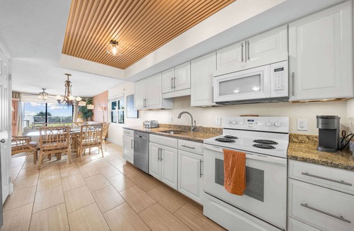 South Patrick Shores Condo | Bright Cozy Condo with Pool & Stunning Ocean Views
