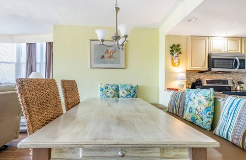 New Smyrna Beach Condo | Bright & Cozy Poolside Retreat in Oceanfront New Smyrna Beach Condo!