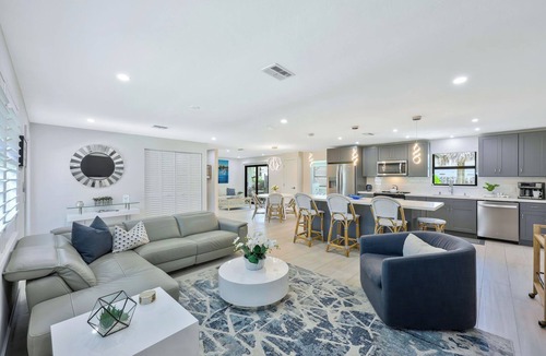 Connors House | Canal Dreamin | Heated Pool Mini Golf Waterfront Oasis Near Vanderbilt Beach