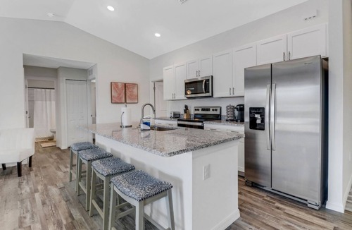 Diplomat House | Canal Home w/Heated Saltwater Pool & Fun Games!