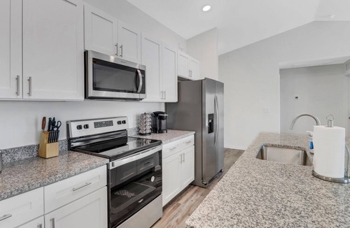 Diplomat House | Canal Home w/Heated Saltwater Pool & Fun Games!