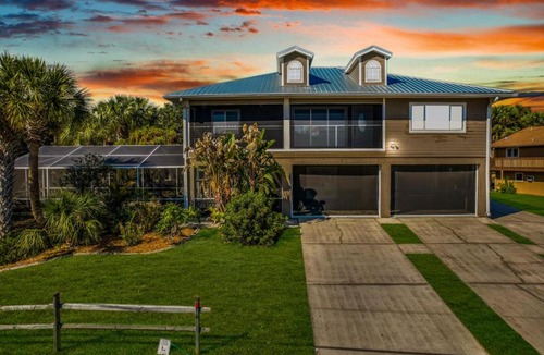 Woods N Waters House | Canal home with pool, kayaks, private dock, firepit sleeps 9