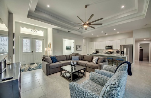 Pelican Villa | Cape Paradise - Magnificent 4 BR Villa with heated saltwater pool, kayaks, bikes, and fishing poles