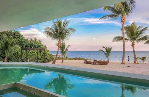 Marathon House | Casa Mare 5 bedroom 6 bath Tropical Oasis on the Ocean Pool, Sandy back yard and beach in Grassy Key