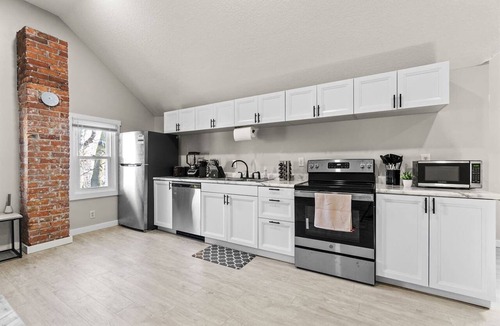 West Central Apartment | Character-Filled Downtown Apartment | Brick & Wood Details