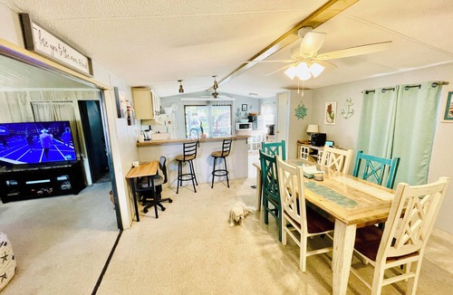Weeki Wachee Gardens House | Charming 2/2 waterfront farm home with tons of TV stations, WiFi, dock, & more