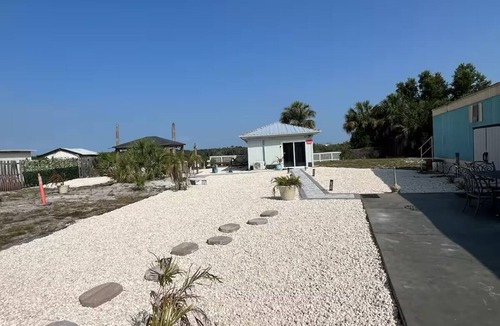 Southside Rural Community House | Charming 2-bedroom 2-full bath home with fishing dock, kayaks, WiFi, AC and more