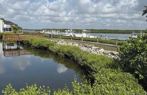 Fort Pierce Shores House | Charming 3-bedroom townhome with a river view and a 40 boat slip in Fort Pierce