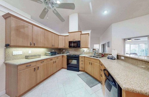 Englewood House | Charming beachside duplex steps to the Gulf with bikes and coastal views