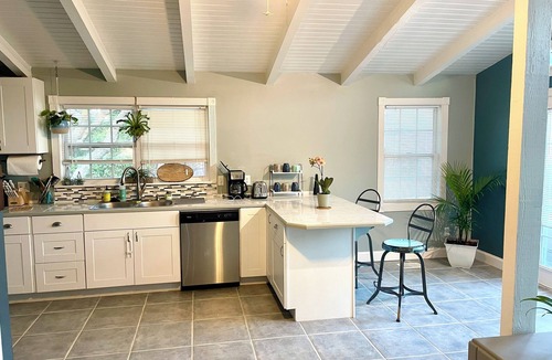 Butler Beach House | Charming Canal Front Cottage! Walk to the Beach!