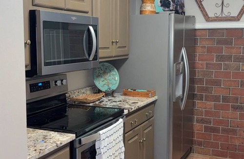 Grenada Condo | Charming condo 3-bedroom 2 bath, 2 living rooms! Stocked kitchen, laundry room