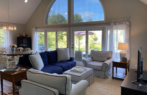 Elk Rapids House | Charming Cottage on Elk River in Elk Rapids – Your Summer Getaway Awaits!