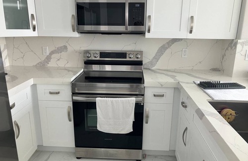 Florida Central Atlantic Coast Condo | Charming home boasting waterfront views with pool and wifi