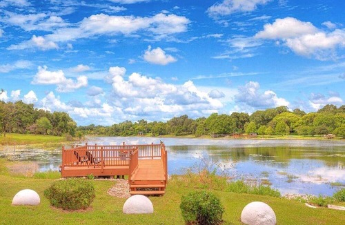 Lake Helen House | Charming Nautical-Themed Inn Room with Private Whirlpool & Lake Views Near Lake Helen, Florida