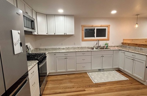 Boyne Falls Cabin | Charming Red Cabin in the woods. A perfect stay just 3 min from ski resort!