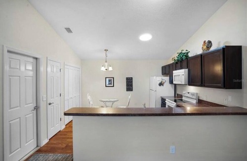 Buttonwood Villa | Cheerful 2 Bedroom Villa with Golf Cart and a GREAT Location!