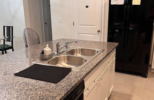 Durant House | Chic 2-bed 1.5-bath townhouse in a secure community, adventures await nearby!n