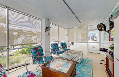 Eden Pines House | Coastal canalfront home with swim spa, dock, kayaks, e-bikes & dog friendly