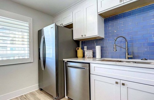 New Smyrna Beach Condo | Coastal Canine Retreat - Newly Renovated w/Pool