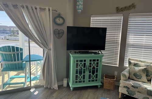 Holiday Isle Condo | Coastal Charm, pet friendly, private beach, free beach chairs service.