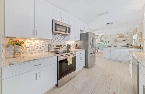 Convair Cove House | Cocoa Beach Waterfront Home with Private Pool and Dock | Rocket Launch Views