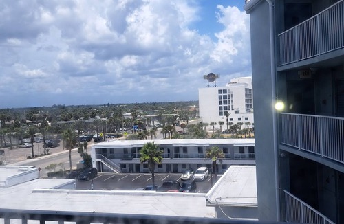 Houghton Daytona Condo | Come chill with us. Enjoy this cozy condo with beach access and a pool.