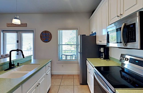 Gulf Lagoon Beach Condo | Community Pool, Canal Views, Near Area Fun!