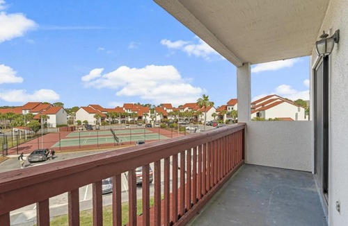 Gulf Lagoon Beach House | Condo near the water with pool tennis balcony grill washer&dryer AC