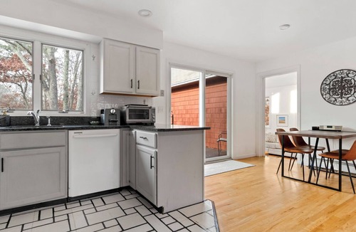 Flanders House | Contemporary Hampton Bays home on one acre of manicured lawn, private pool,.