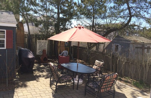 Ship Bottom Apartment | Cozy 2 bedroom Apartment Half block to beach, Front deck, Fenced in backyard.